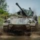 Tank Driving Experience showing a Tank Driving Through a huge puddle