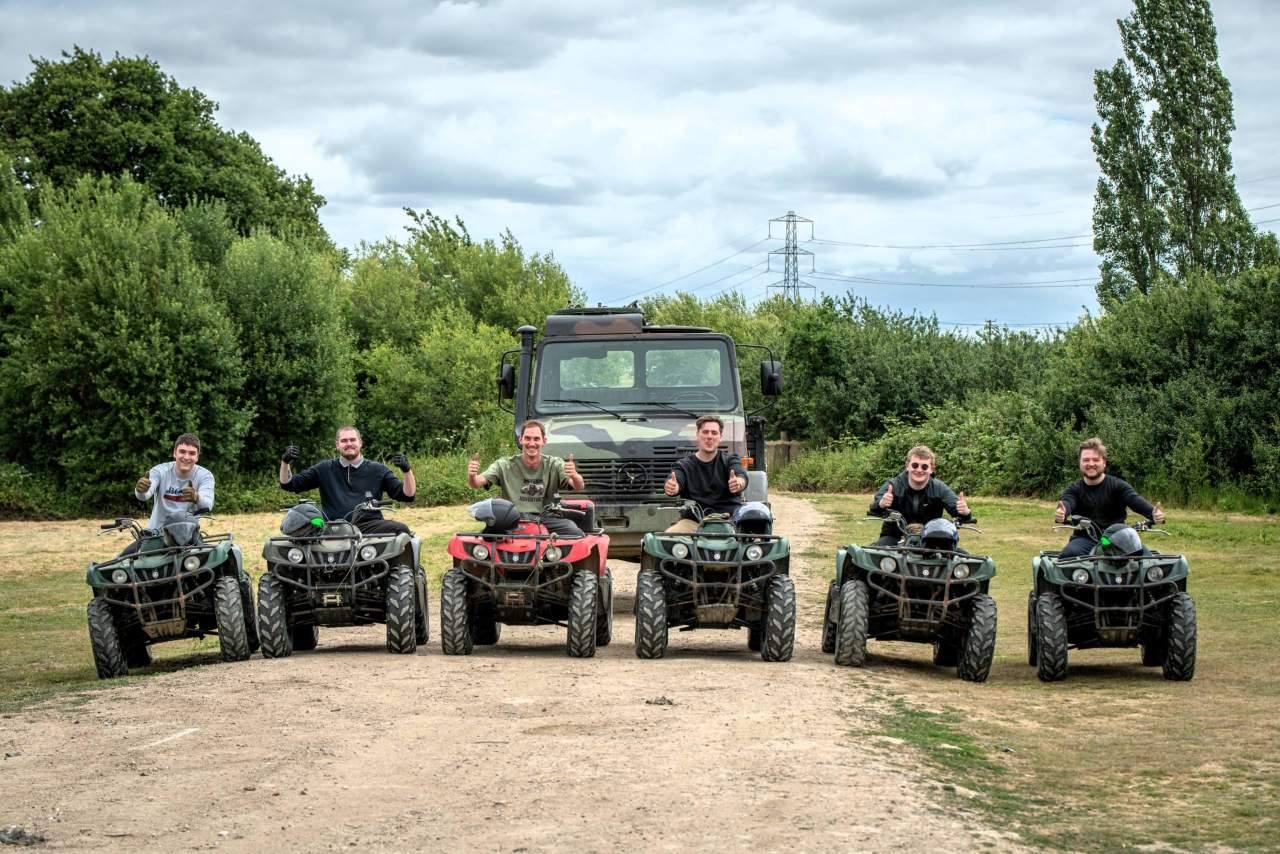 A group of participants on a stag do enjoying their Quad Bike Experience on 350cc Quad Bikes at Imperiumadventures.com in Faversham, Kent